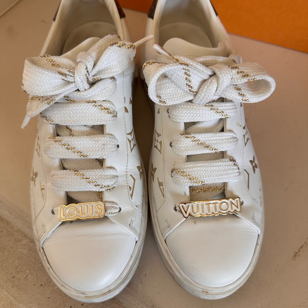 Louis Vuitton White and Gold Sneakers with Minimalist Design